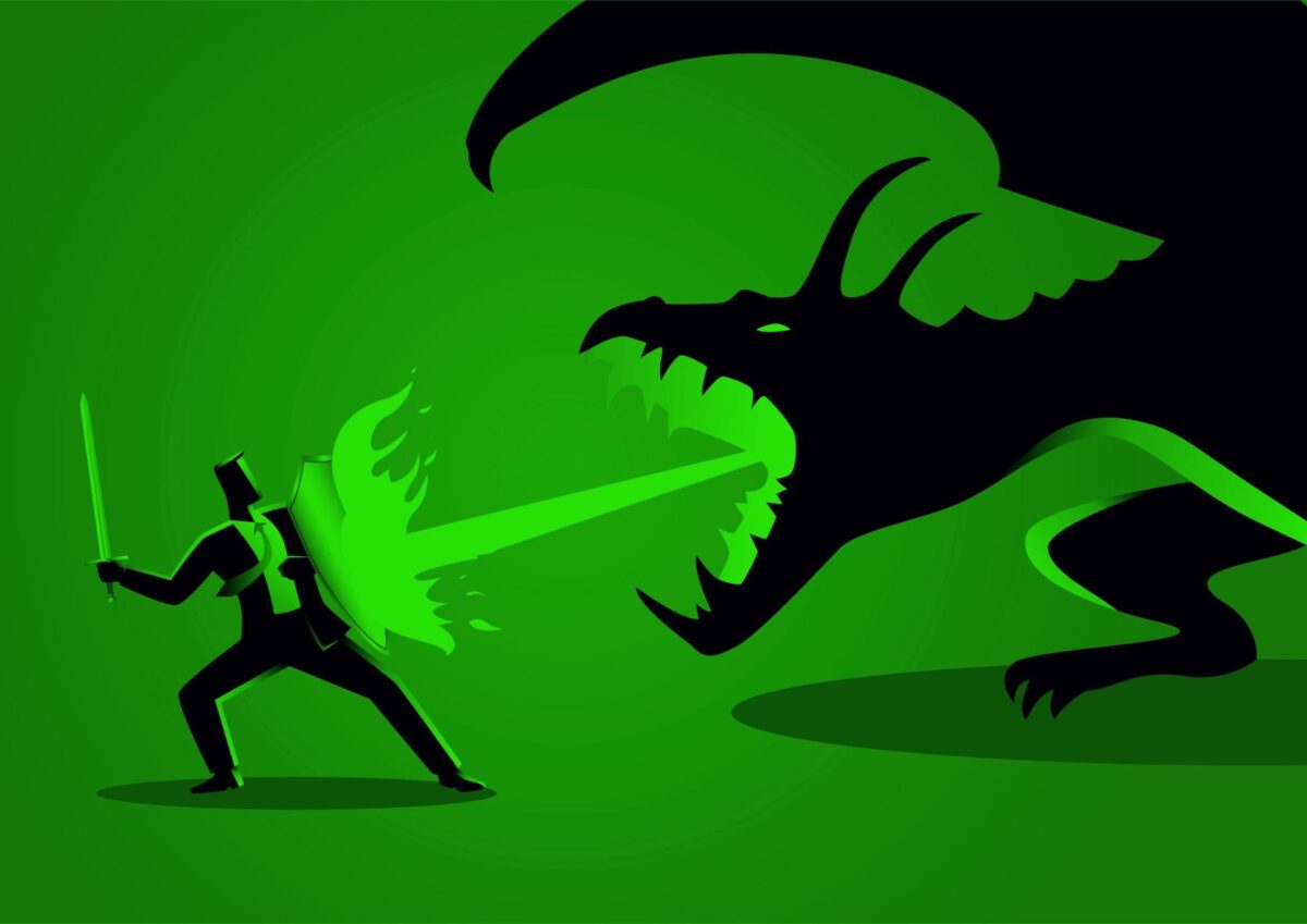 Clipart of a man holding a sword and shield fending off a fire-breathing dragon